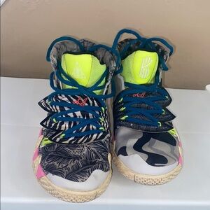 Nike Blue and Green Sneakers with Intricate Design
